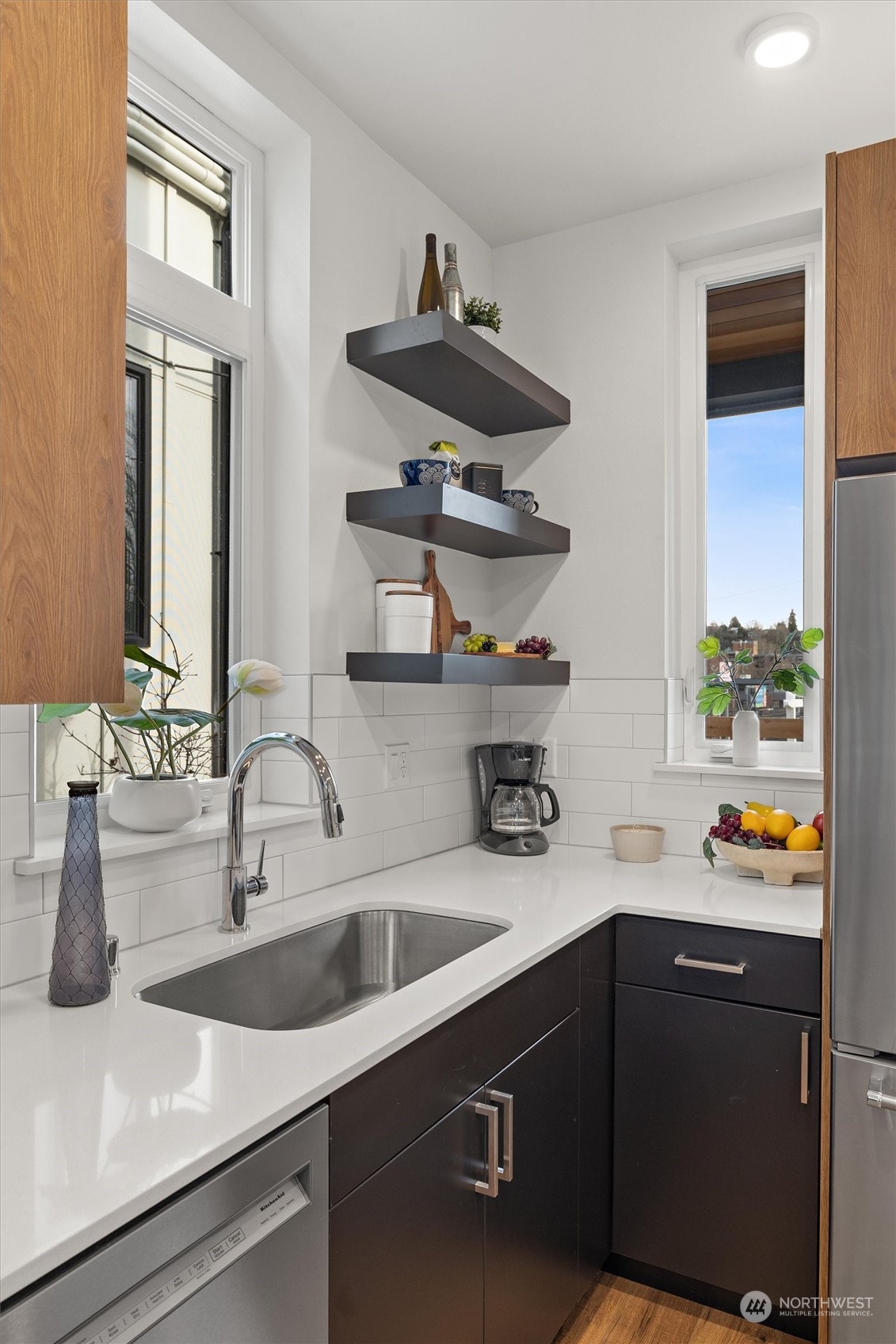 2119 South Walker Street, Unit B Seattle, WA 98144 - Photo 7 of 23 a kitchen with a sink and a potted plant