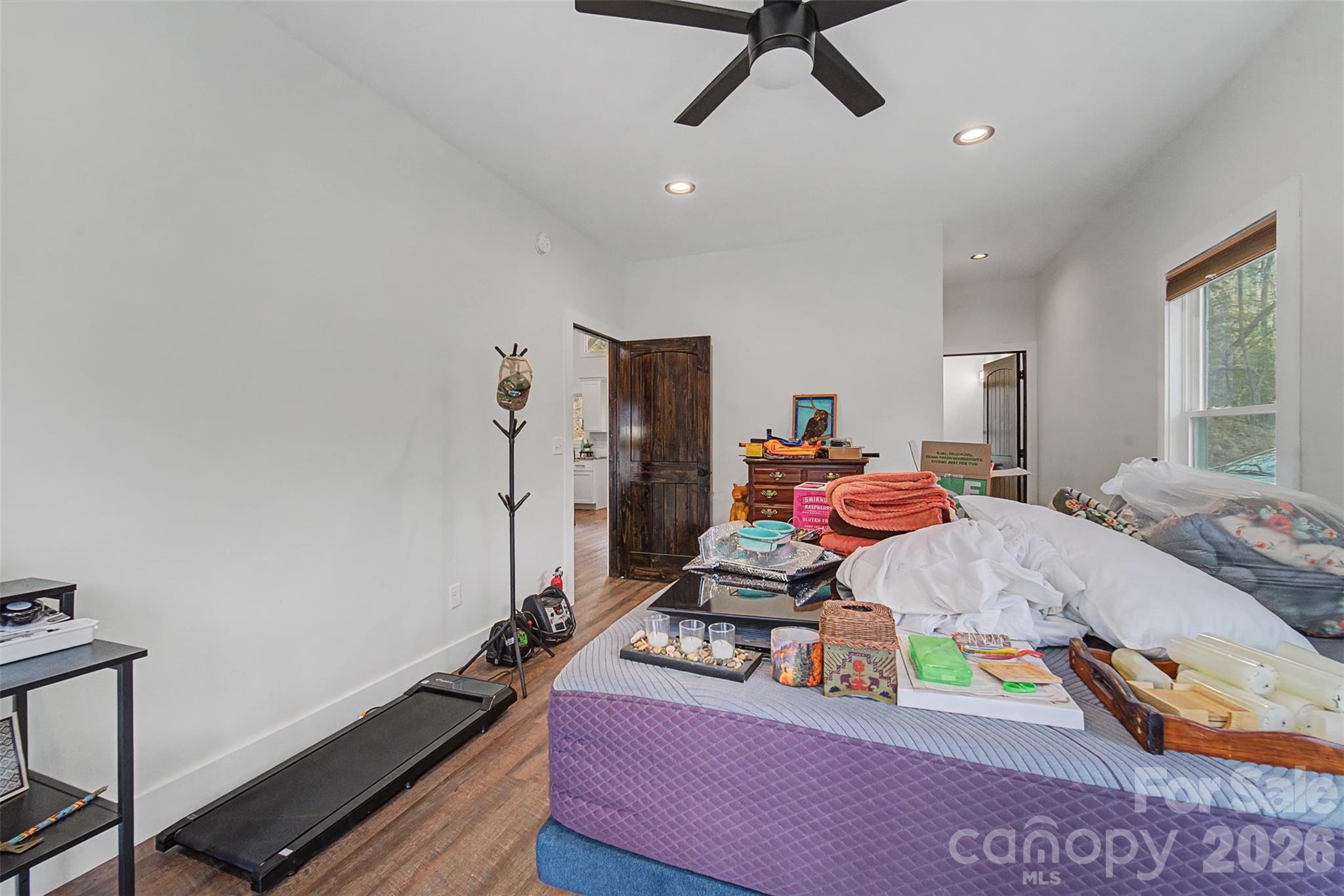 79 Abbey View Road Bryson City, NC 28713 - Photo 25 of 48 a room with furniture and a flat screen tv