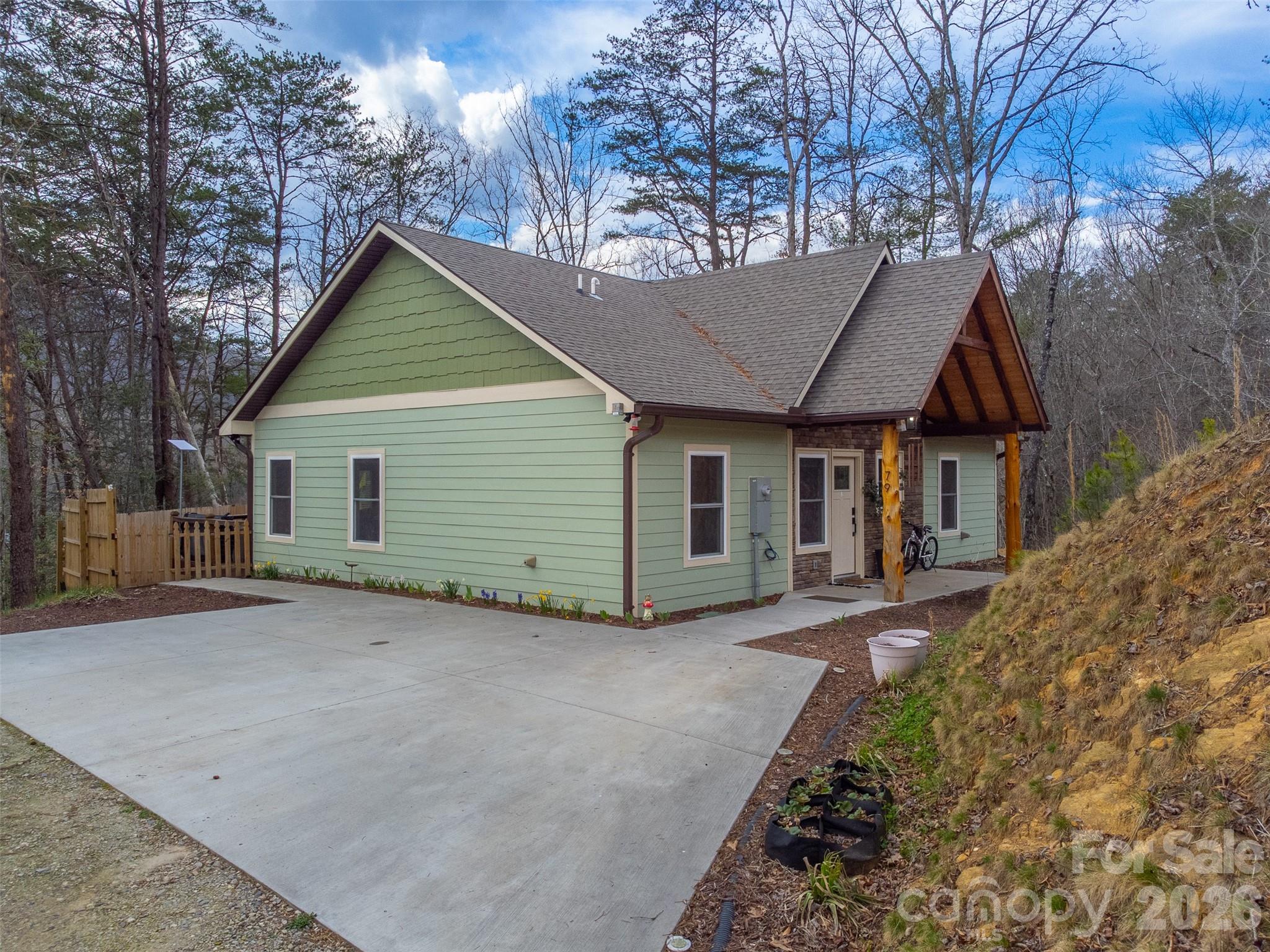 79 Abbey View Road Bryson City, NC 28713 - Photo 3 of 48 a view of a house with a yard