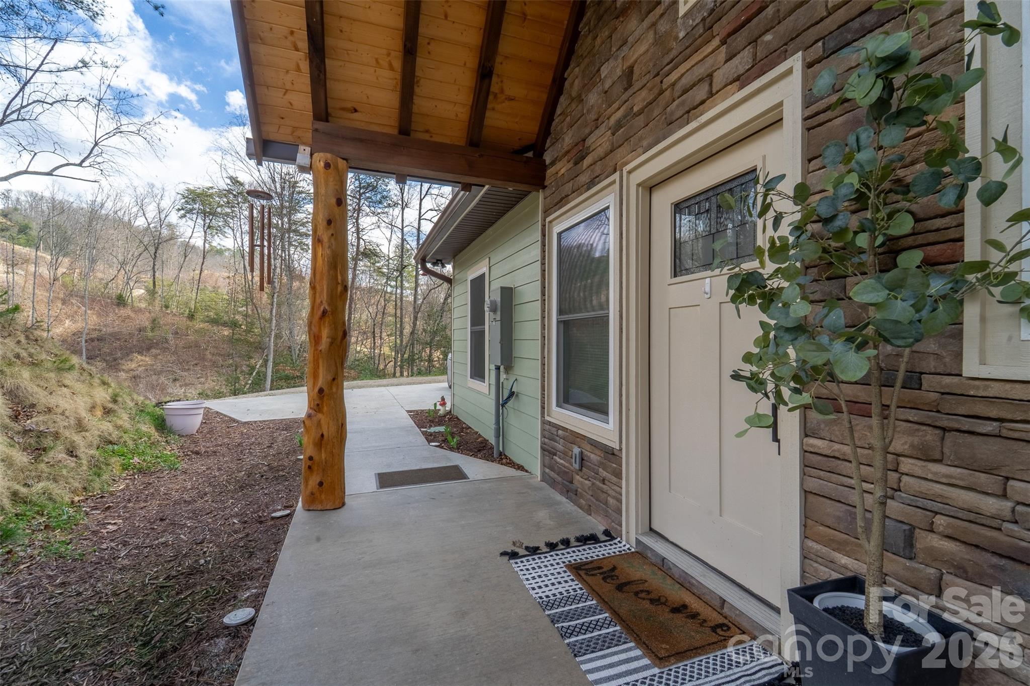 79 Abbey View Road Bryson City, NC 28713 - Photo 36 of 48 a view of a porch with wooden floor and fence
