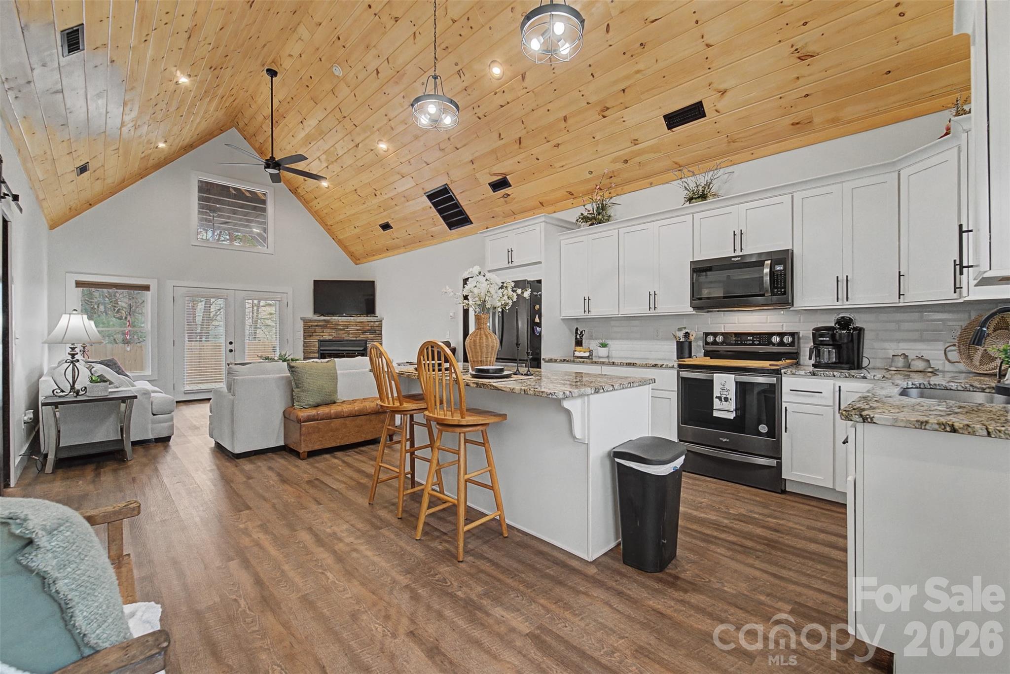 79 Abbey View Road Bryson City, NC 28713 - Photo 8 of 48 a kitchen with a sink a counter space appliances and cabinets