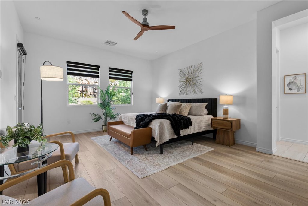 20 Charlotte Ridge Place Henderson, NV 89011 - Photo 19 of 33 Blissful bedroom retreat with private access to outdoor patio.