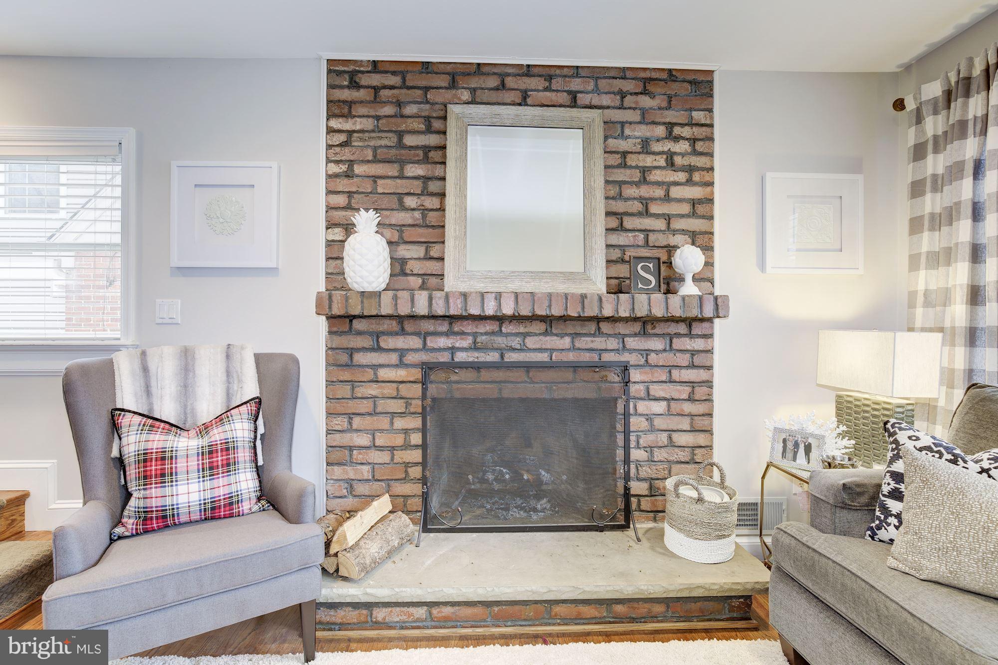 4510 Chestnut Street Bethesda, MD 20814 - Photo 4 of 26 Living Room with wood burning fireplace