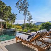 a view of a yard with furniture