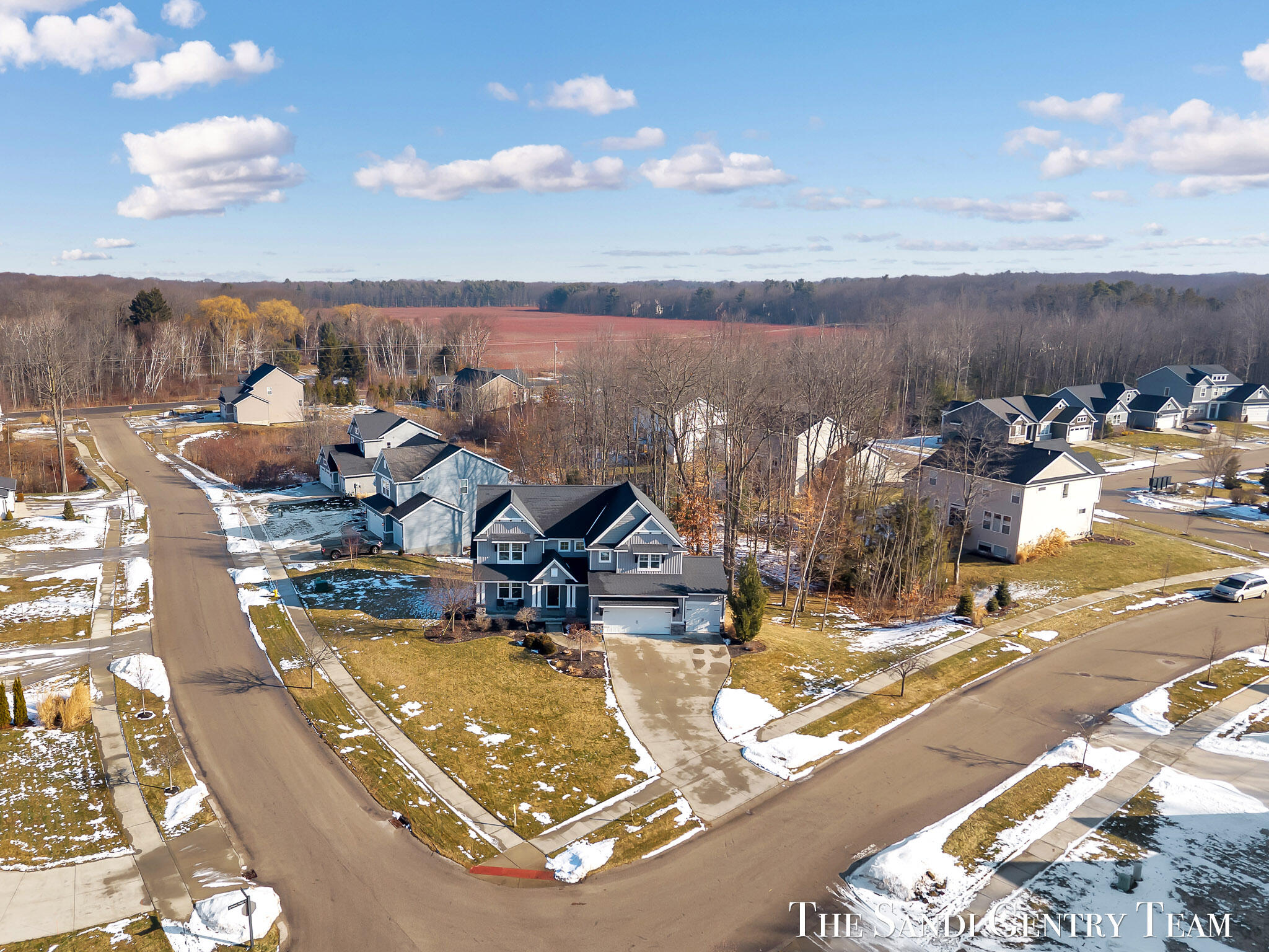 16575 Spring Tree Drive Spring Lake, MI 49456 - Photo 3 of 61 09-DJI_20260227101403_0016_D
