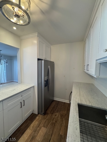50 West Lindsley Road, Unit 42 Cedar Grove, NJ 07009 - Photo 4 of 26 a kitchen with a refrigerator and a sink