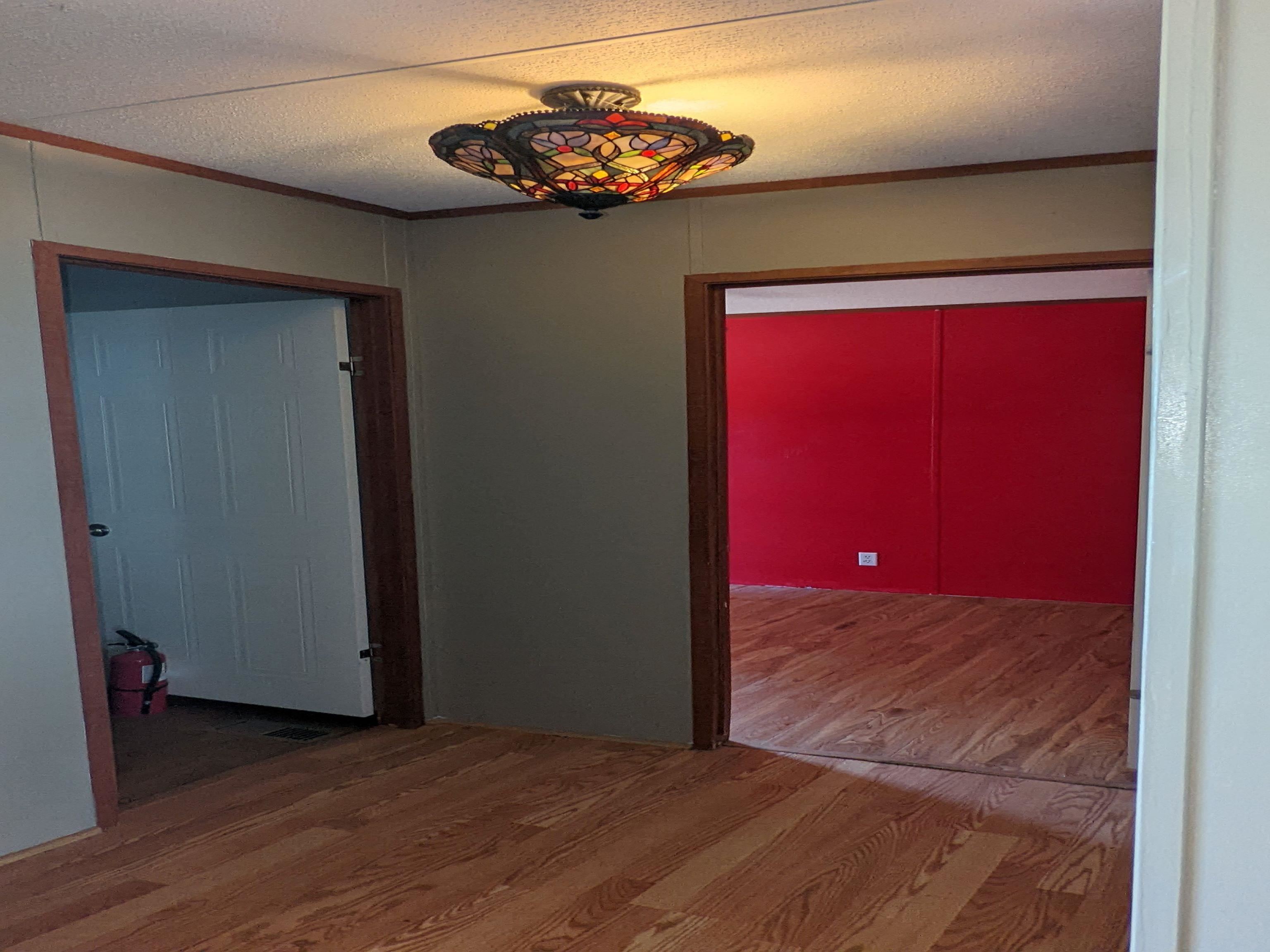 793 Robertson Road Mason, TN 38049 - Photo 12 of 23 a view of a livingroom with wooden floor
