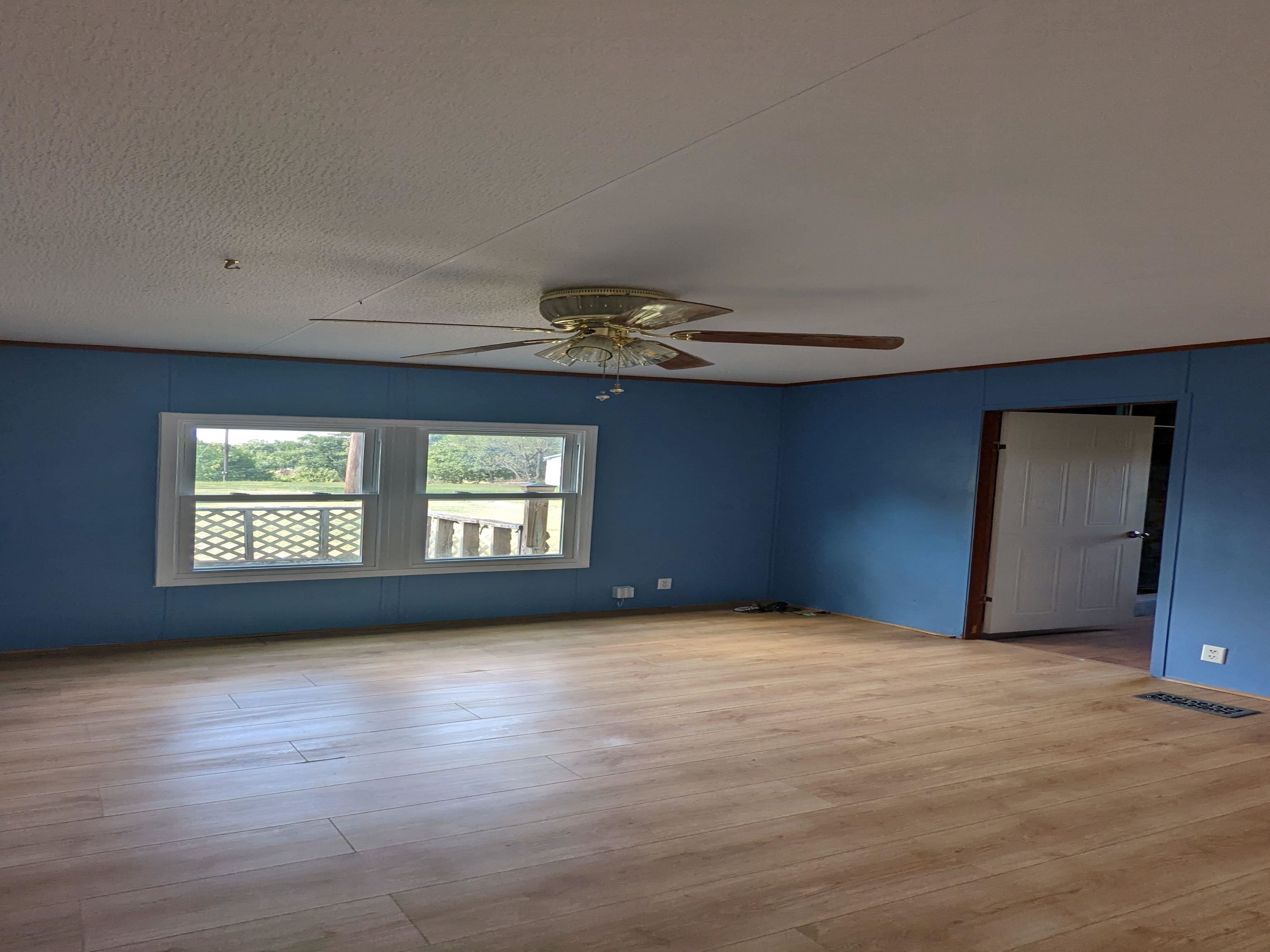 793 Robertson Road Mason, TN 38049 - Photo 9 of 23 a view of an empty room with a window