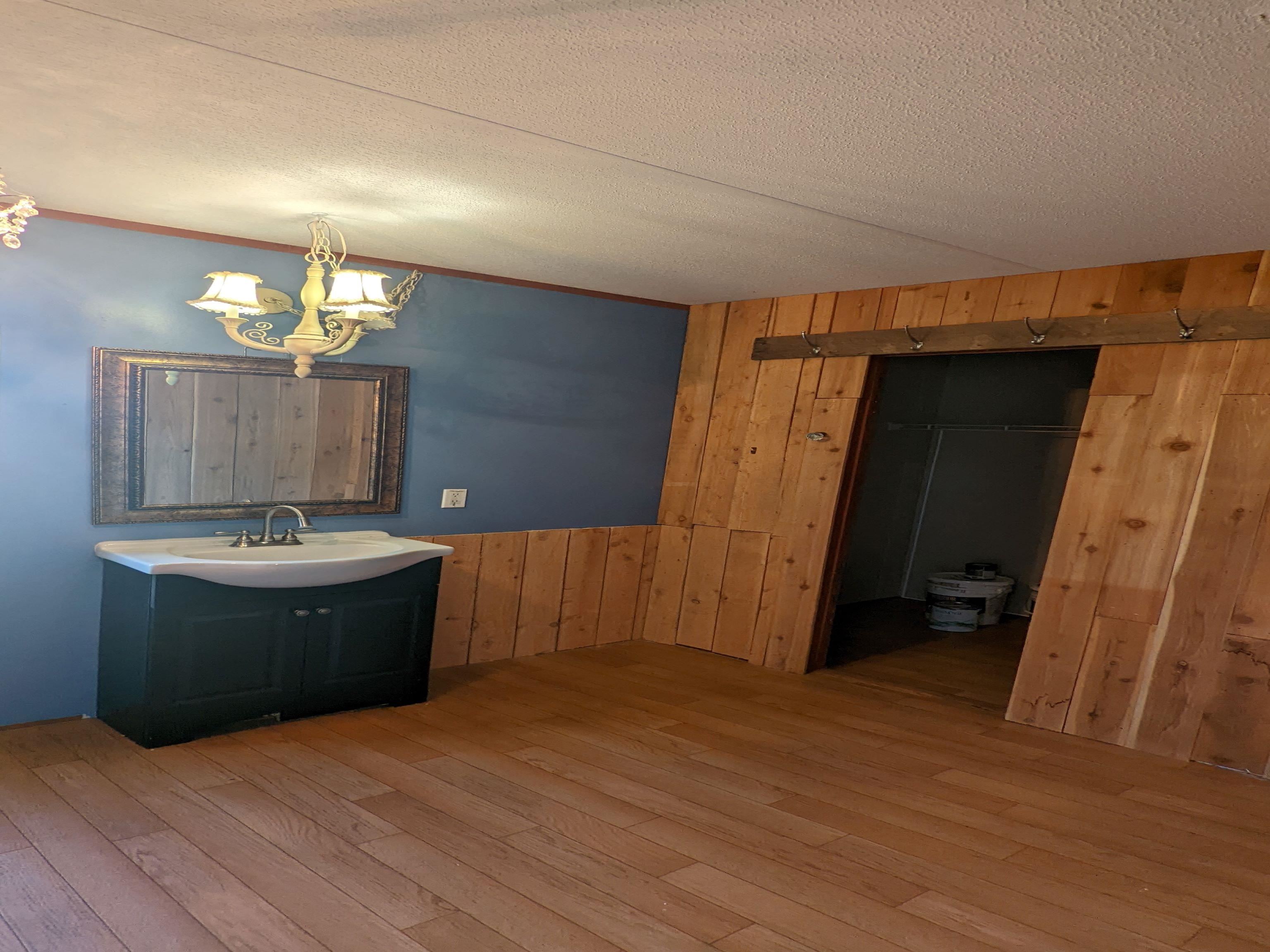 793 Robertson Road Mason, TN 38049 - Photo 10 of 23 a view of a bathroom with tub and sink