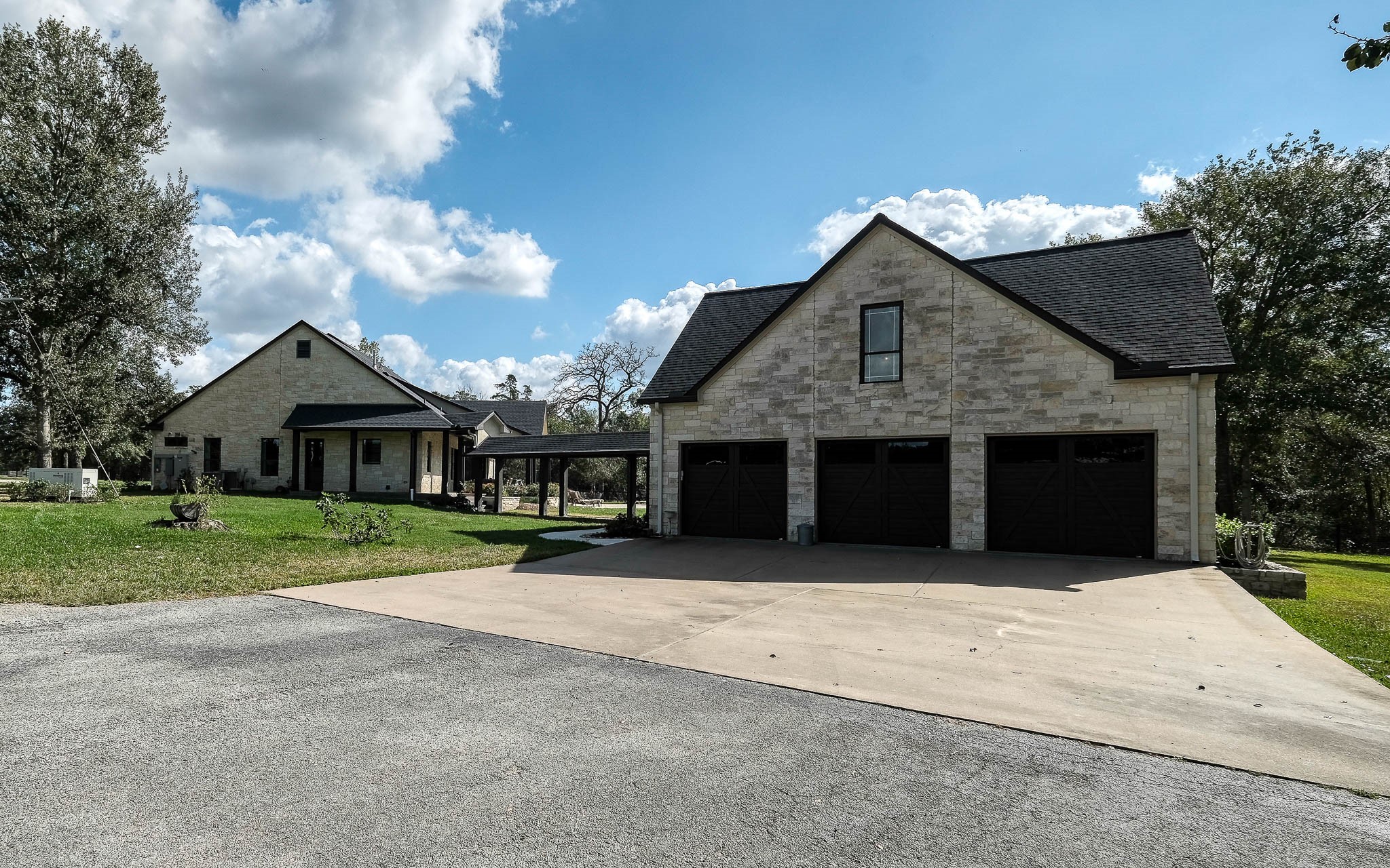 22474 Kmiec Road Hempstead, TX 77445 - Photo 39 of 49 a front view of a house with a yard and garage