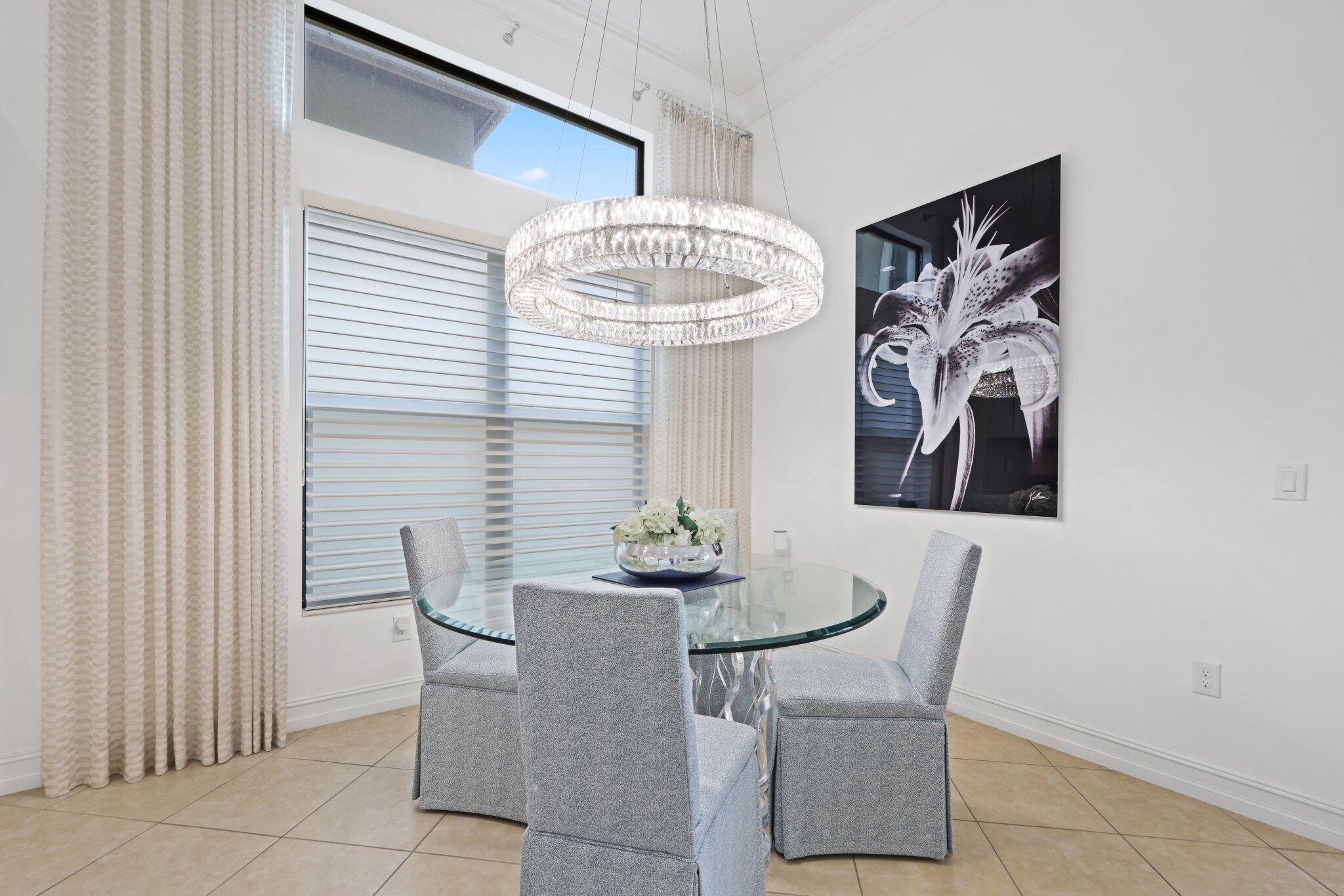 8539 Lewis River Road Delray Beach, FL 33446 - Photo 17 of 49 a dining room with furniture and window