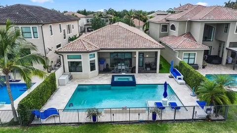 a view of house and outdoor space with swimming pool