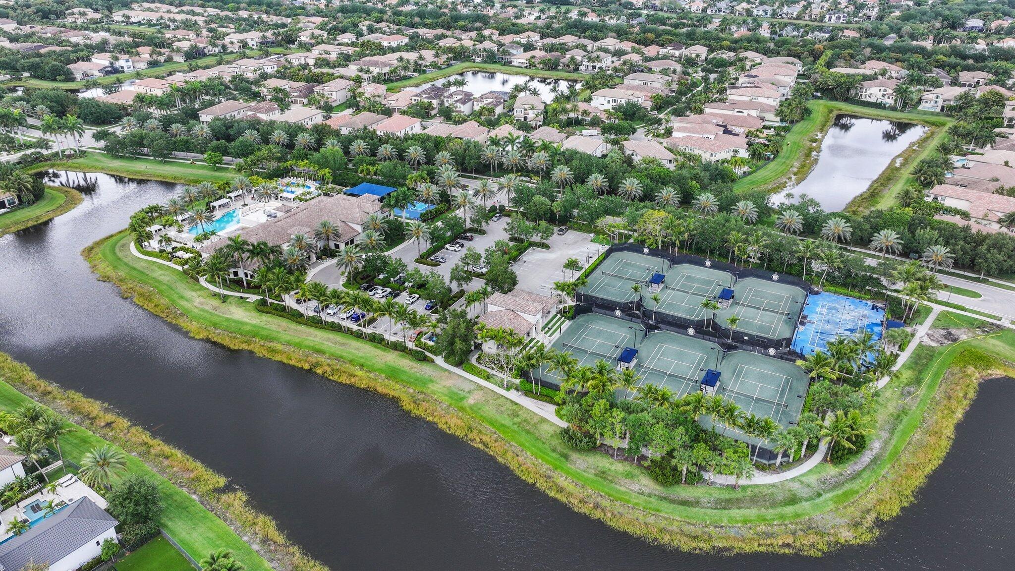 8539 Lewis River Road Delray Beach, FL 33446 - Photo 43 of 49 an aerial view of a house with a yard and outdoor seating