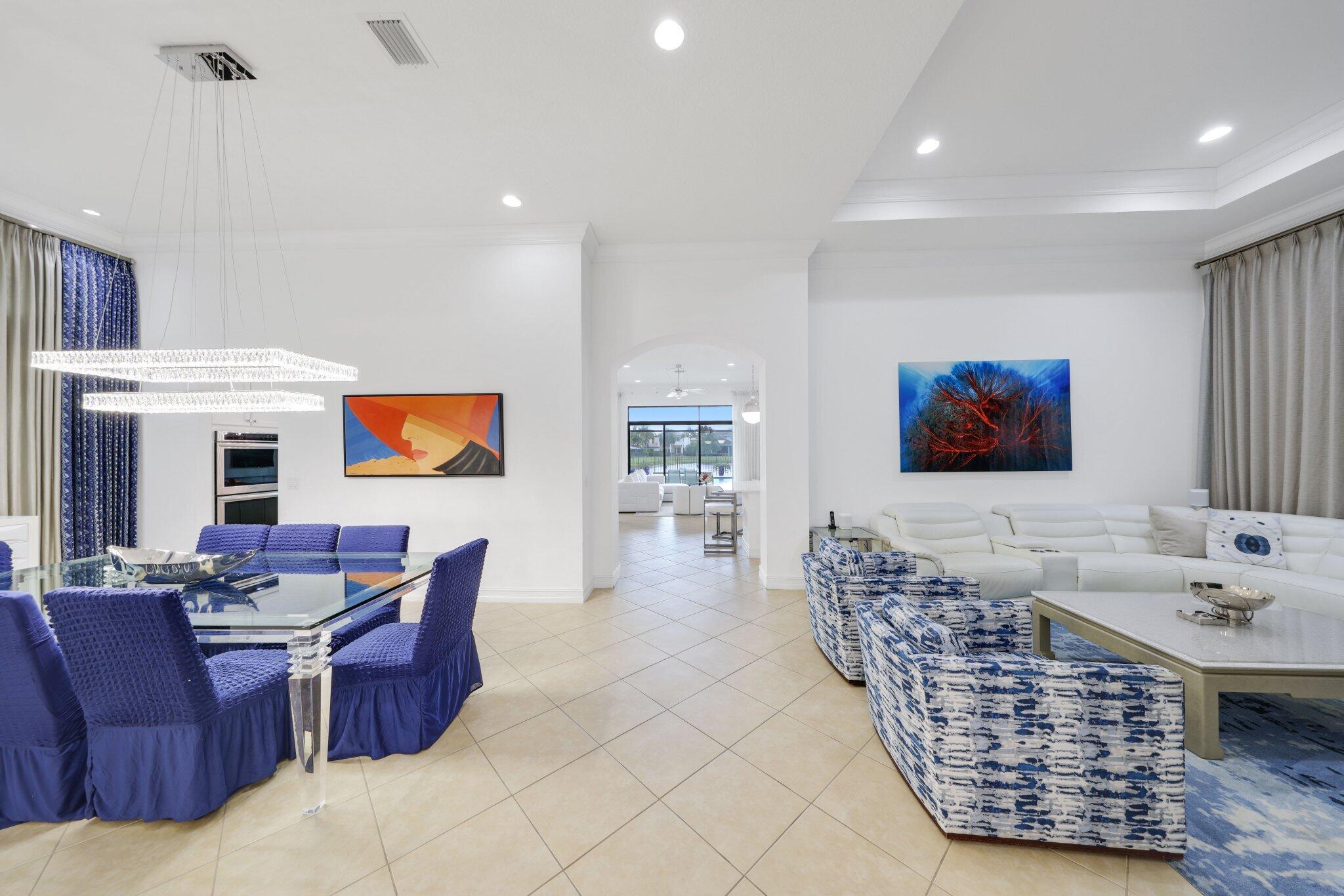 8539 Lewis River Road Delray Beach, FL 33446 - Photo 7 of 49 a living room with furniture and a flat screen tv