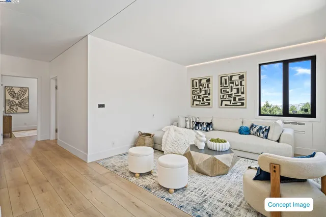 a living room with furniture and a table