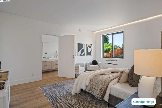 a bed room with a bed and a window