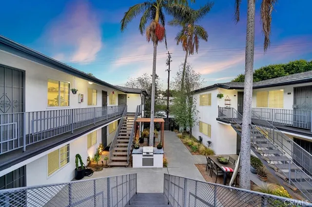 a view of balcony with furniture