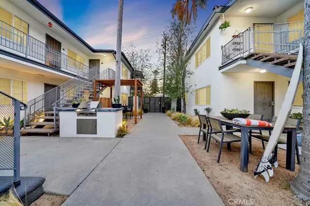 a view of a building with sitting area