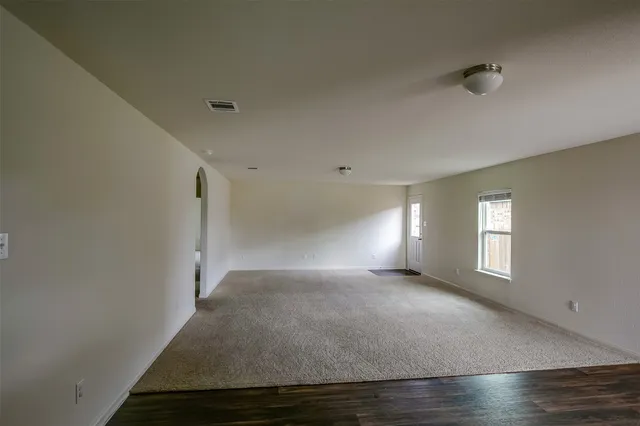 a view of a hallway with window