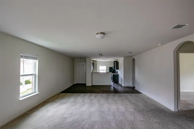 a view of a kitchen and window