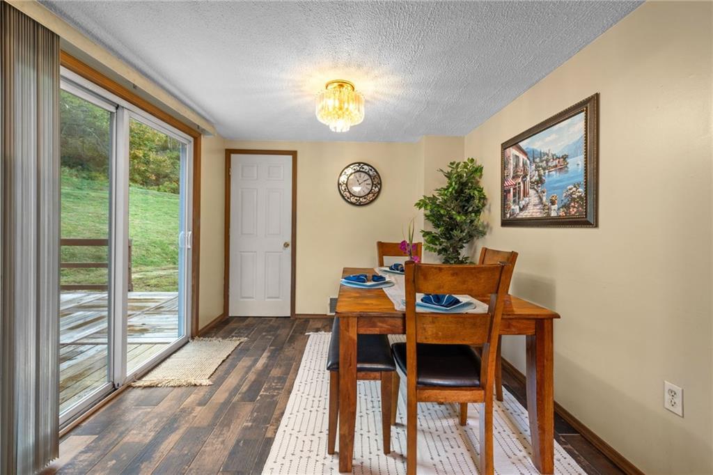 2381 Highway 18 Clinton, PA 15026 - Photo 14 of 27 a view of a dining room with furniture and a large window