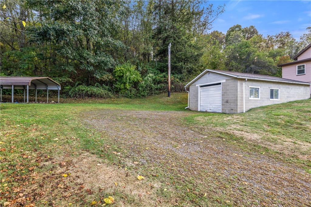 2381 Highway 18 Clinton, PA 15026 - Photo 27 of 27 a view of a house with a yard and sitting area