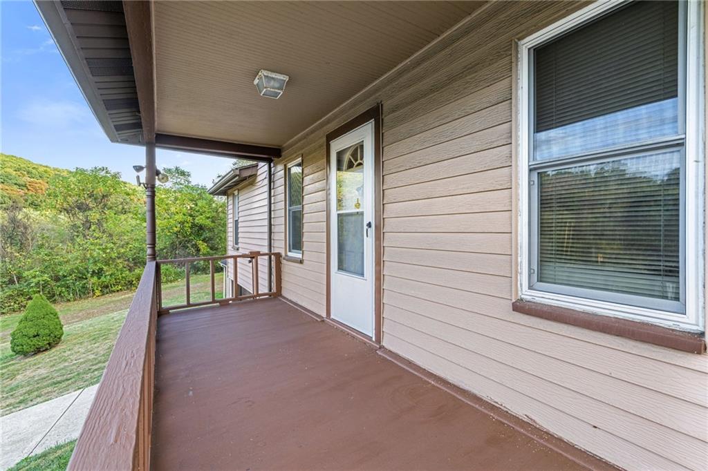 2381 Highway 18 Clinton, PA 15026 - Photo 3 of 27 a view of a porch with a floor to ceiling window
