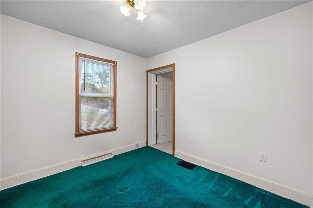 2381 Highway 18 Clinton, PA 15026 - Photo 10 of 27 an empty room with a window