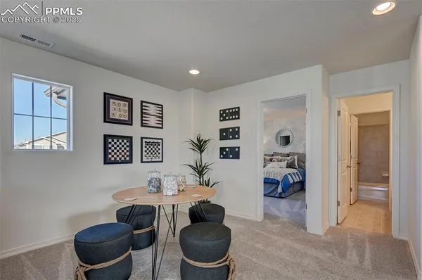 a living room with furniture and a table