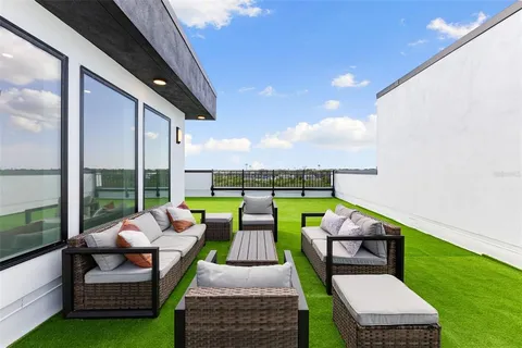 a view of a terrace with a yard