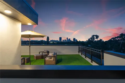 a view of a livingroom with a staircase