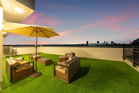 a view of a city with an ocean view