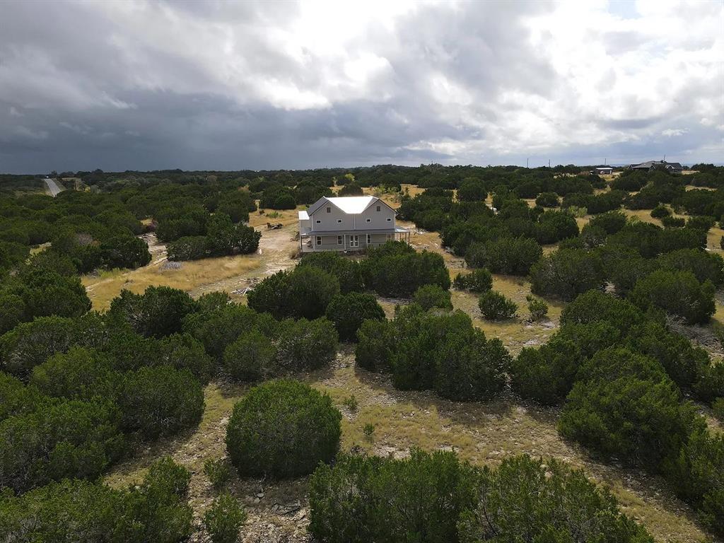 1901 Greystone Ranch Road Bertram, TX 78605 - Photo 19 of 34 a view of a lake