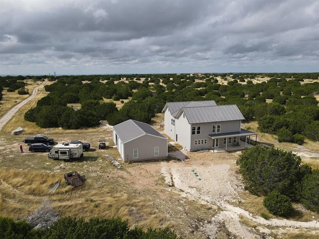 1901 Greystone Ranch Road Bertram, TX 78605 - Photo 20 of 34 a view of a terrace with a garden