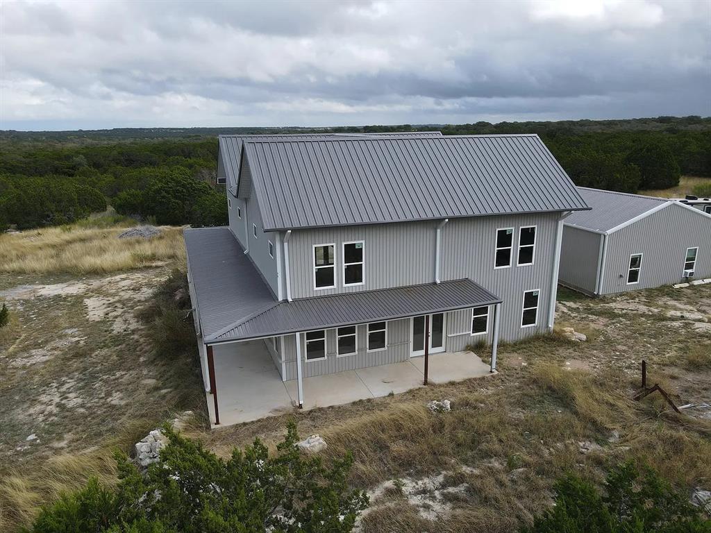 1901 Greystone Ranch Road Bertram, TX 78605 - Photo 24 of 34 front view of a house with a yard