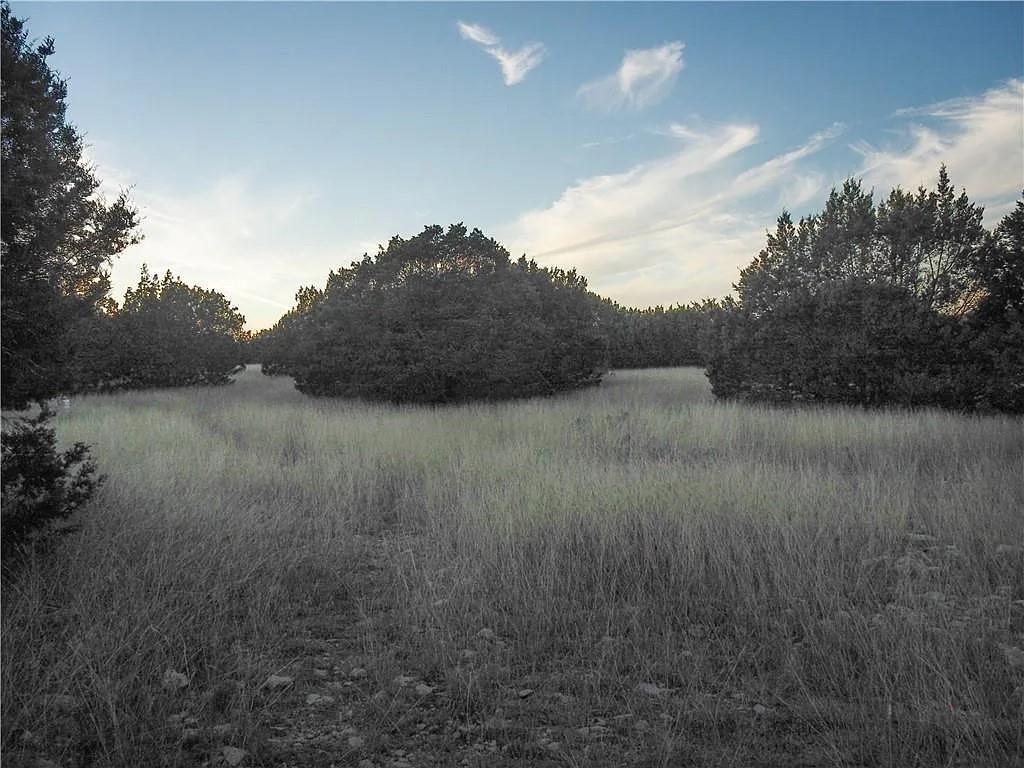 1901 Greystone Ranch Road Bertram, TX 78605 - Photo 32 of 34 a view of lake with green space