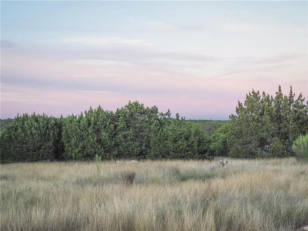 1901 Greystone Ranch Road Bertram, TX 78605 - Photo 34 of 34 a view of a lake and green valley