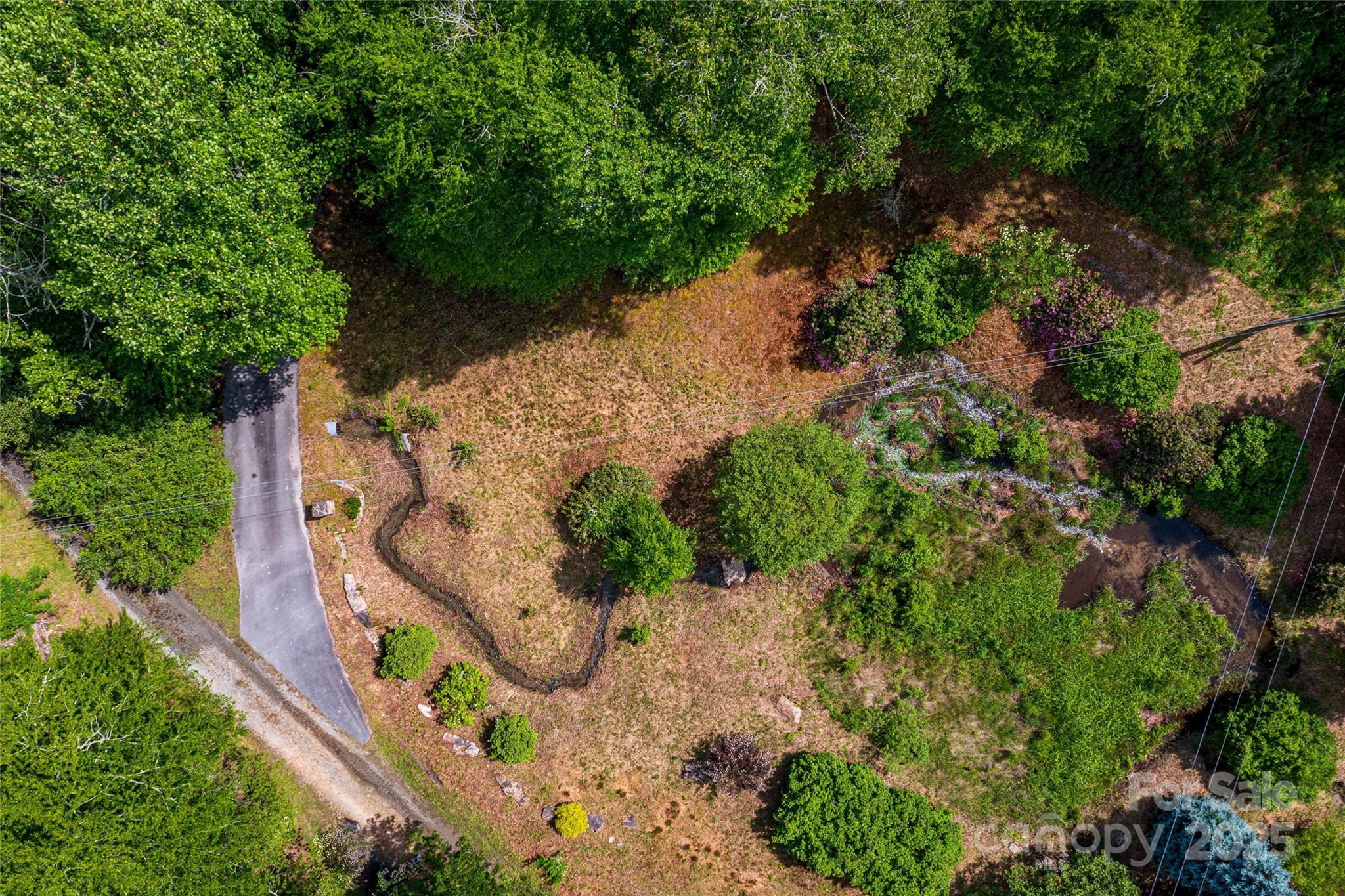 Tbd Memory Lane Cullowhee, NC 28723 - Photo 38 of 41 an aerial view of a house with a yard