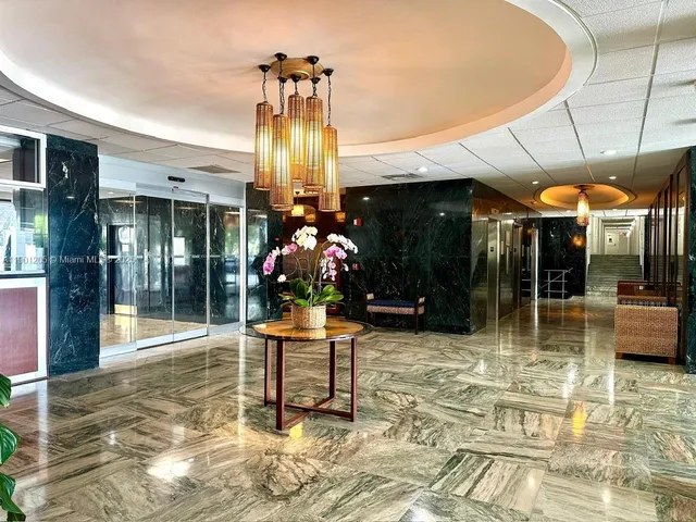 a view of a chairs and tables in the patio