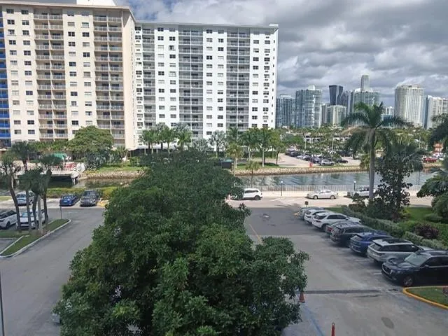 a view of a city with tall buildings