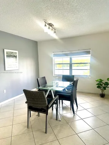 a workspace with furniture and window