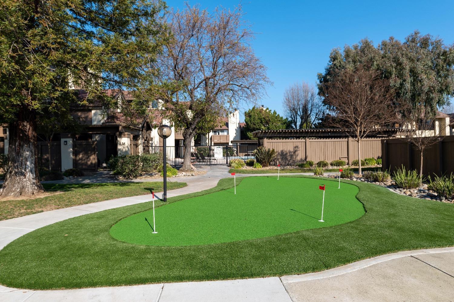 3701 Colonial Drive, Unit 34 Modesto, CA 95356 - Photo 7 of 10 a view of a swimming pool with a patio
