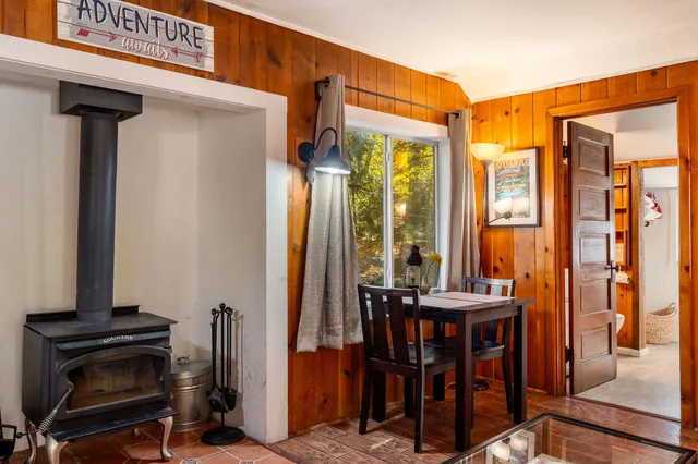 a view of a livingroom with furniture and front door