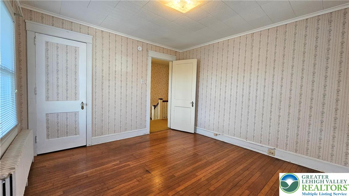 1936 Kemmerer Street Bethlehem, PA 18017 - Photo 16 of 27 a view of an empty room with wooden floor