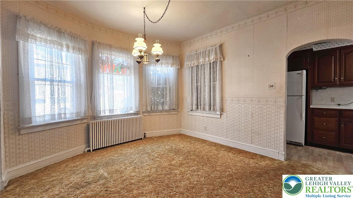 1936 Kemmerer Street Bethlehem, PA 18017 - Photo 8 of 27 a view of an empty room with a window