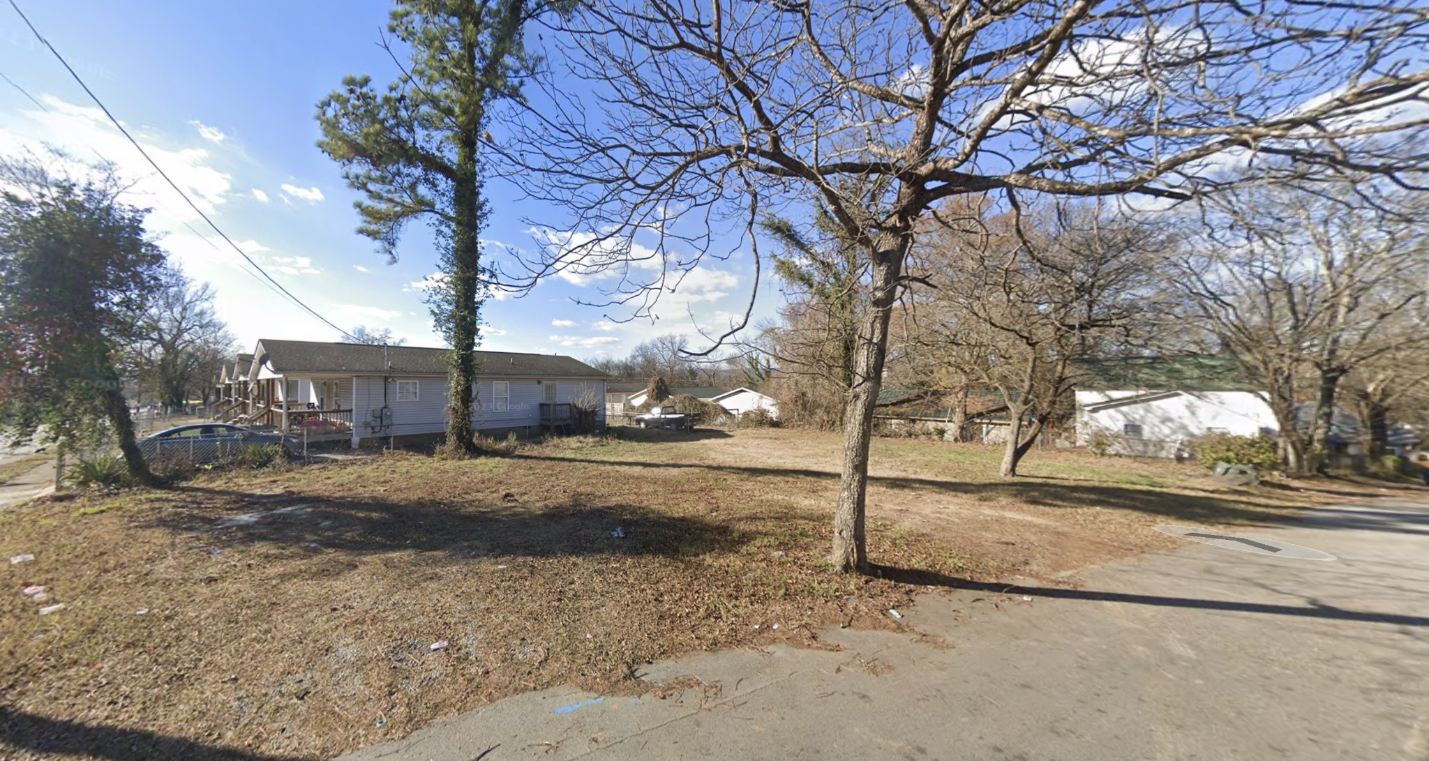 2659 Glass Street Chattanooga, TN 37406 - Photo 4 of 5 a view of a yard with large trees