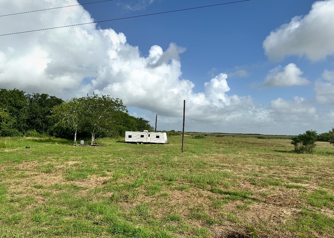 a view of a golf course with a fountain