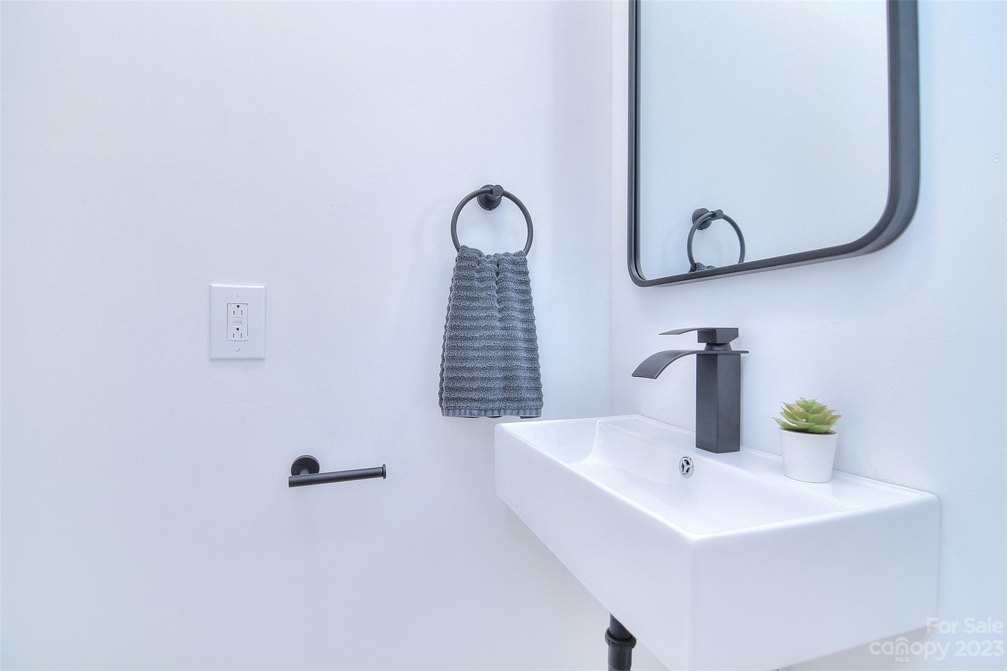 838 Culdesac Road Lancaster, SC 29720 - Photo 19 of 30 a bathroom with a sink and a mirror