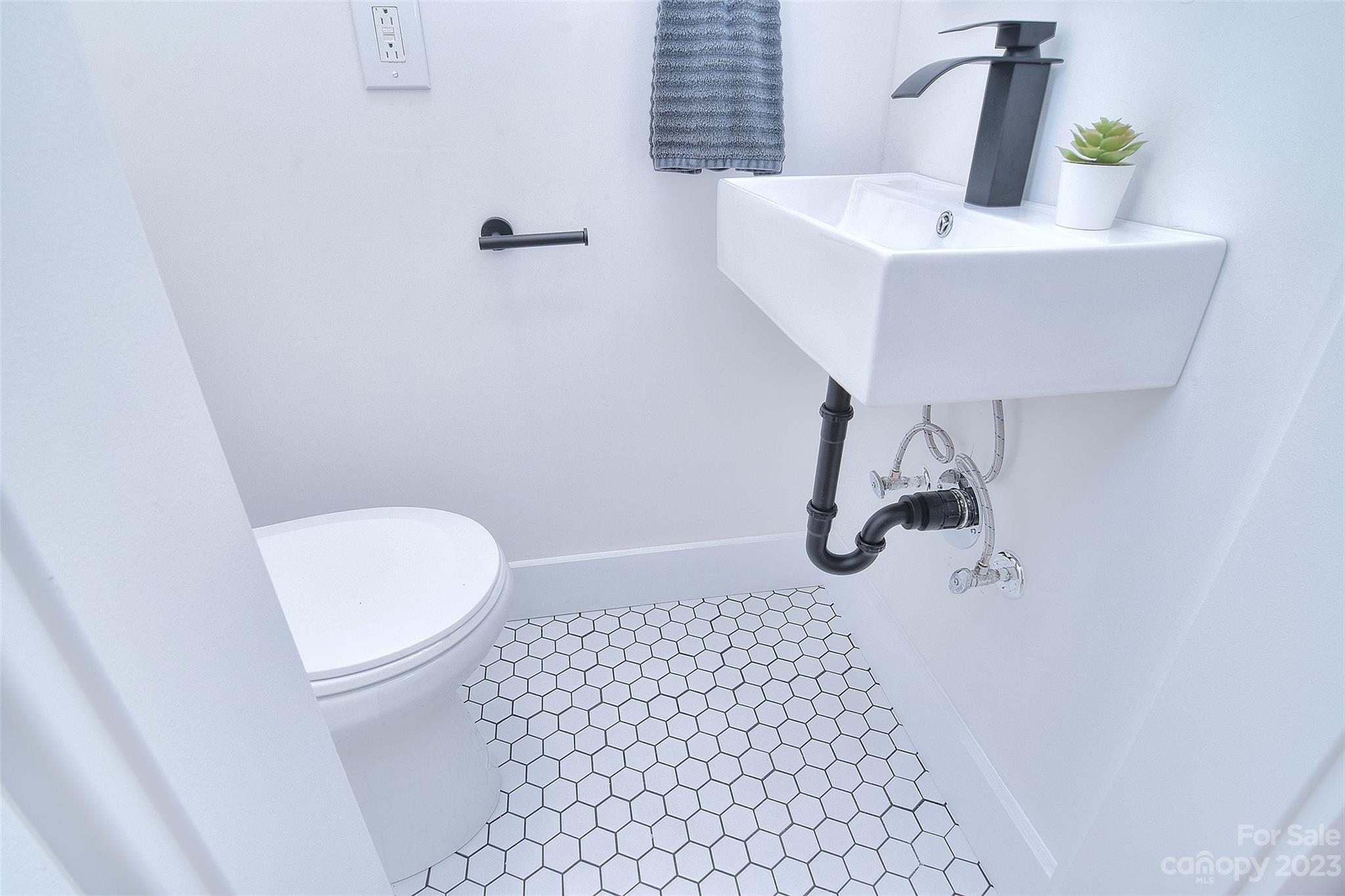 838 Culdesac Road Lancaster, SC 29720 - Photo 20 of 30 a bathroom with a sink toilet and shower