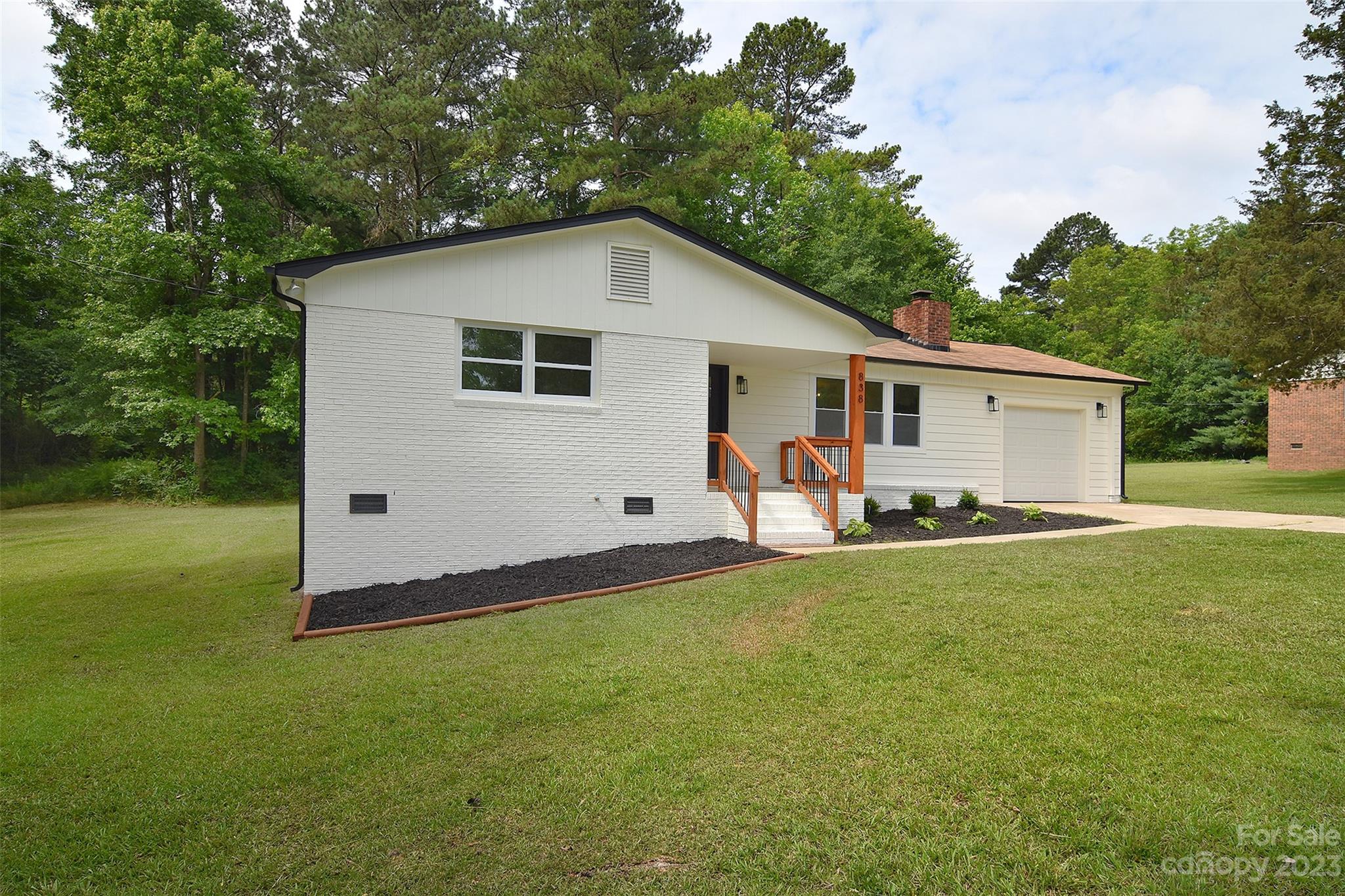 838 Culdesac Road Lancaster, SC 29720 - Photo 25 of 30 a view of a house with backyard and garden